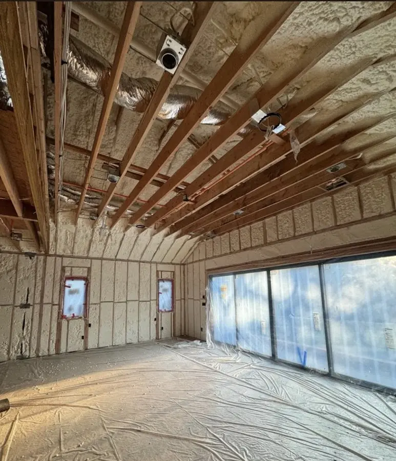 Interior walls and ceiling insulated with spray foam during new construction in Salem